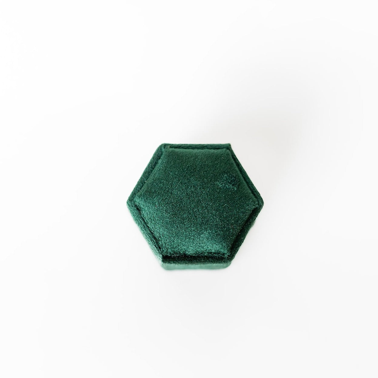 The outside of an emerald hexagon ring box.