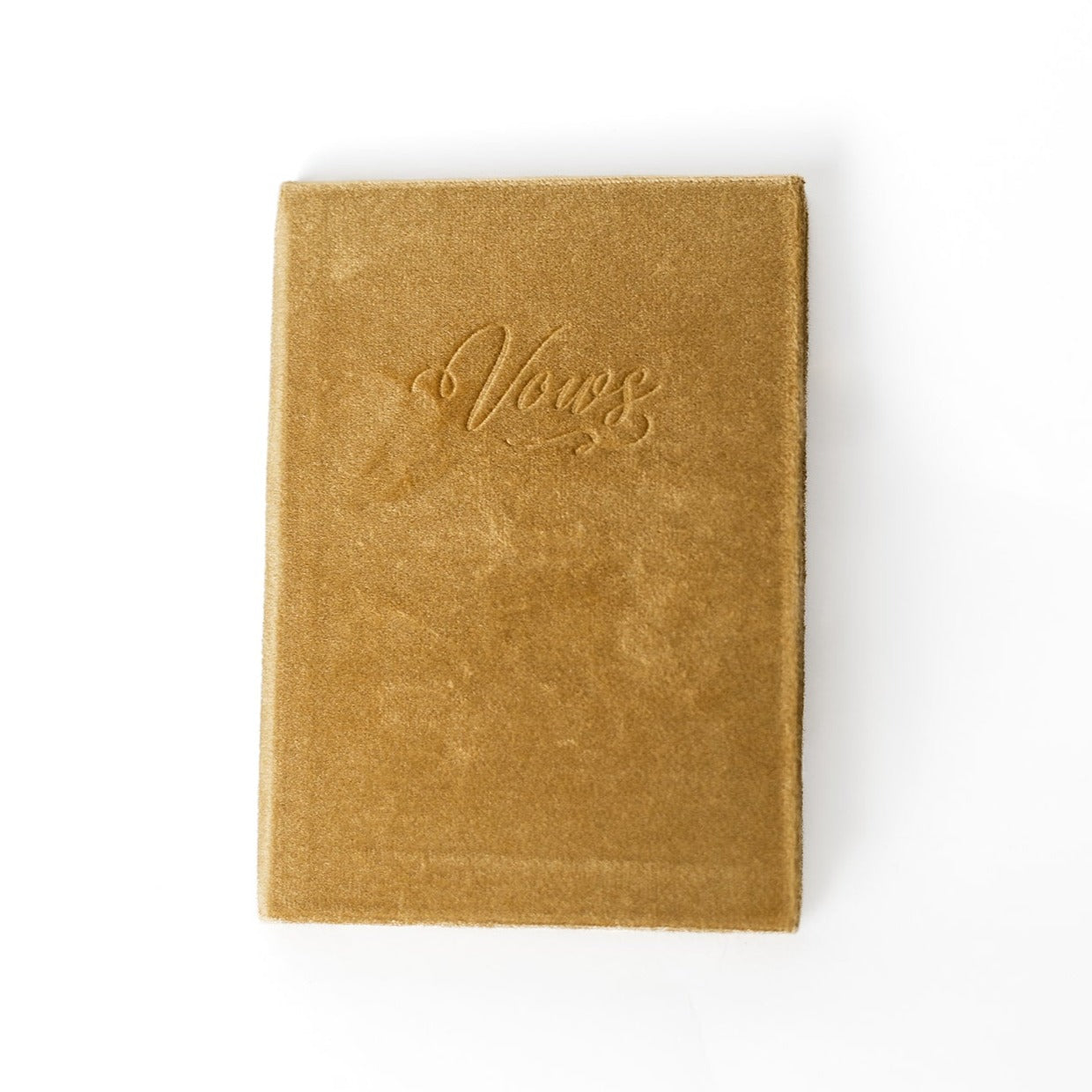 A mustard-coloured vow book with the word "Vows" embossed on the front cover.