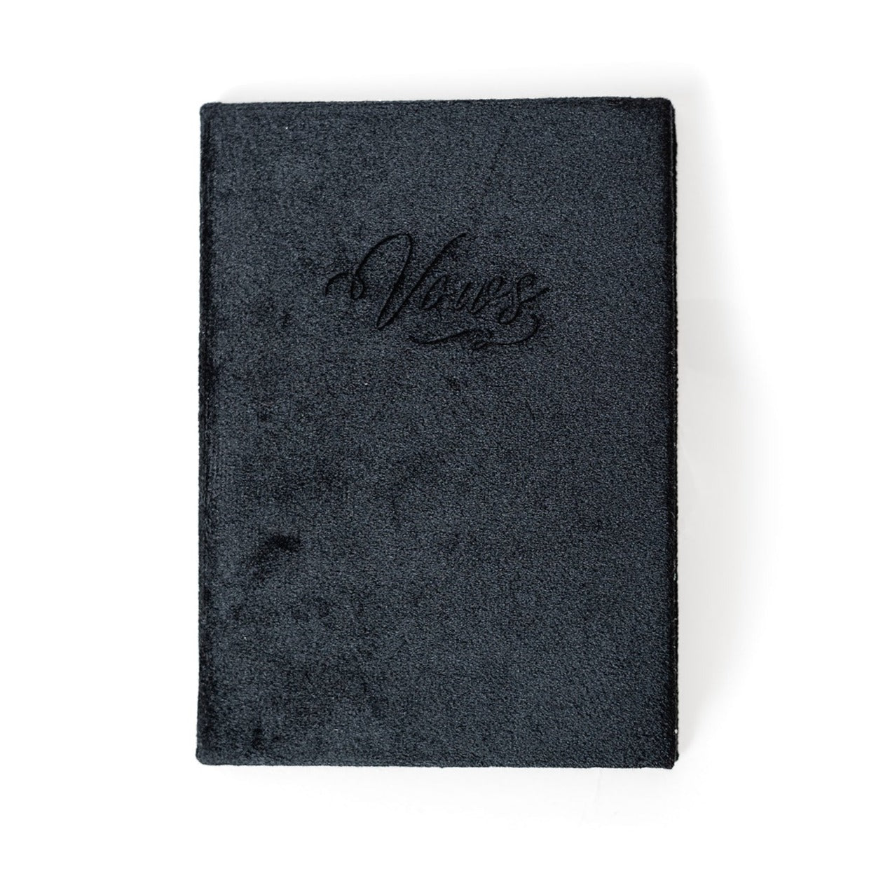A black vow book with the word "Vows" embossed on the front cover.