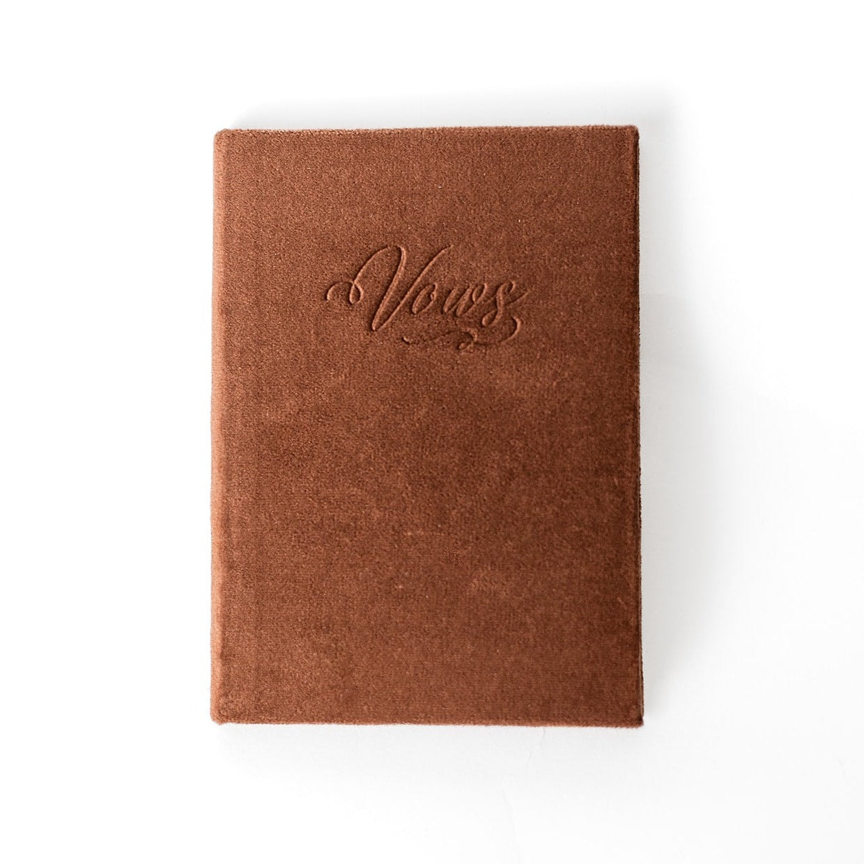 A chocolate-coloured vow book with the word "Vows" embossed on the front cover.