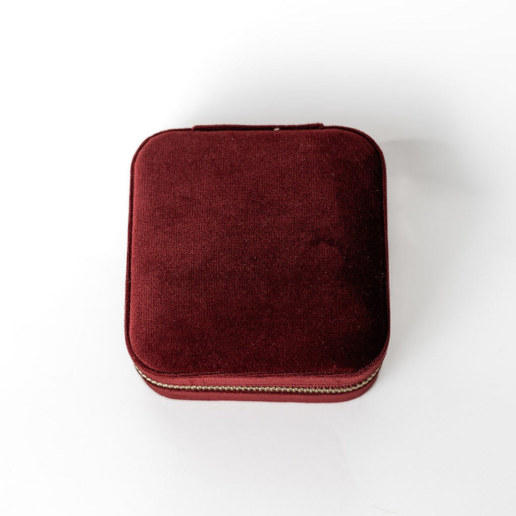 The outside of a merlot jewelry case.